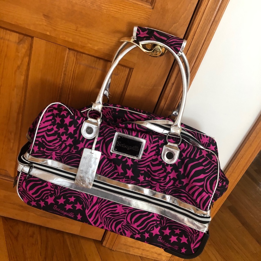 Betsey Johnson duffle roller bag